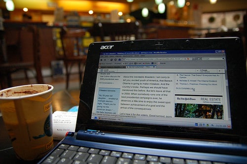 working at the airport on a laptop