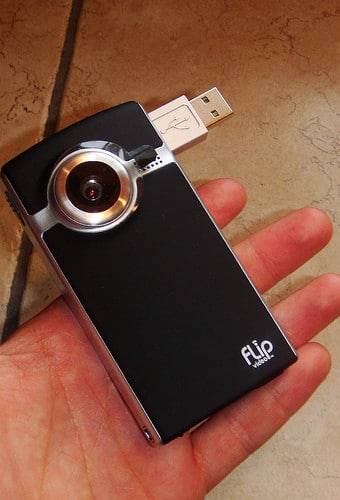 holding flip video camera
