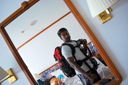 looking at backpack  in mirror